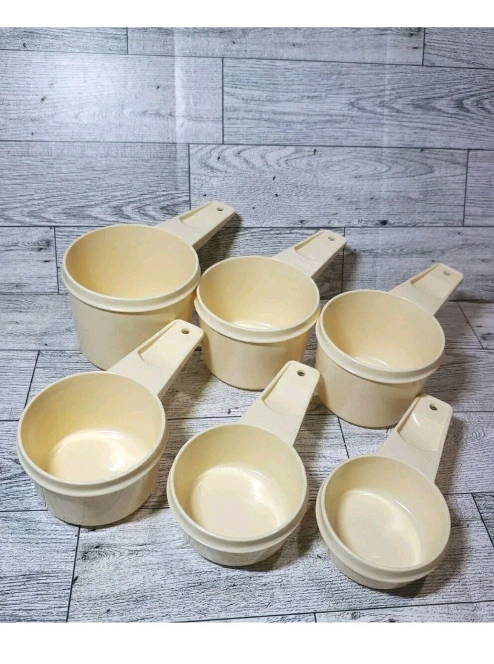 Vtg Tupperware Nesting Measuring Cup Set  Of 6 Almond Cream  USA EUC